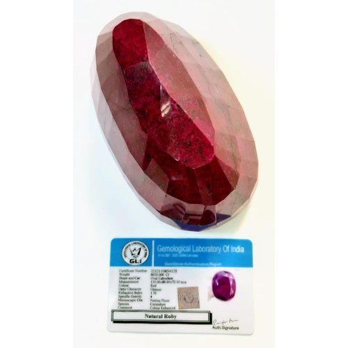 148 - A Humongous 6230ct Earth-Mined African Ruby. Oval Shape with a GLI Certificate. This is a colour-enh... 