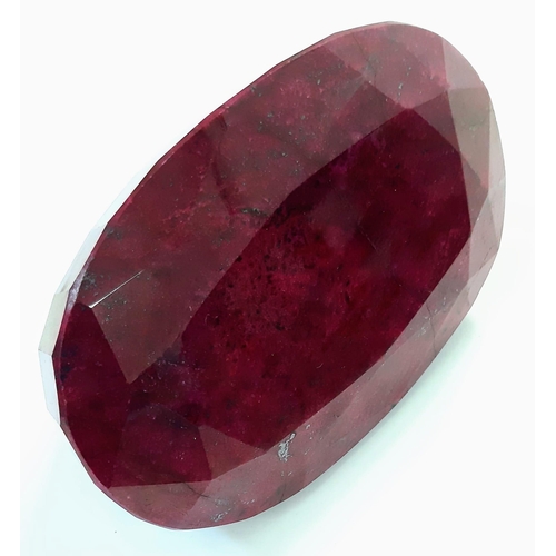 148 - A Humongous 6230ct Earth-Mined African Ruby. Oval Shape with a GLI Certificate. This is a colour-enh... 