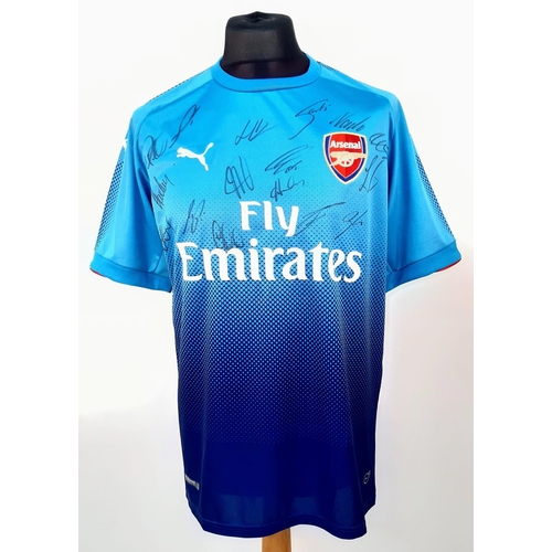 154 - A 2018 Arsenal Football Club Signed Away Fly Emirates (Puma) Blue Shirt. Fifteen signatures. Size XL... 