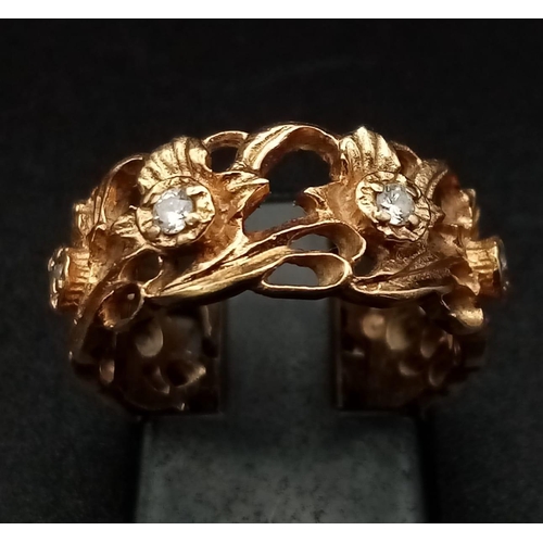 210 - An Art Nouveau, 14 K yellow gold ring with a naturalistic motif and seven diamonds (0.25 carats). Ri... 