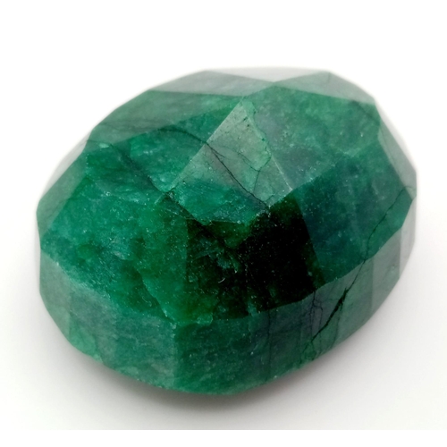 227 - A Huge 746ct Natural Oval Shape Emerald. GLI Certified. This is a colour enhanced gem.