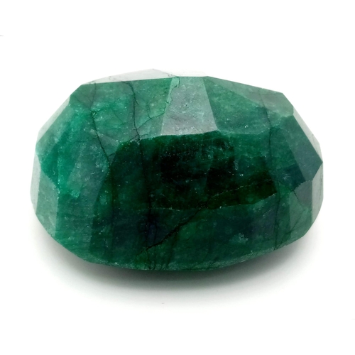 227 - A Huge 746ct Natural Oval Shape Emerald. GLI Certified. This is a colour enhanced gem.