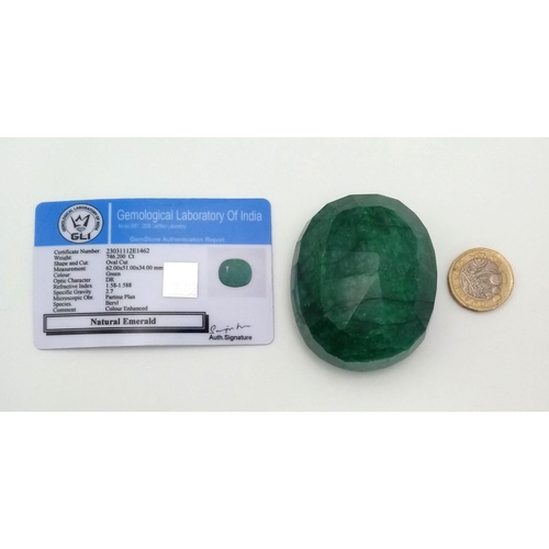 227 - A Huge 746ct Natural Oval Shape Emerald. GLI Certified. This is a colour enhanced gem.