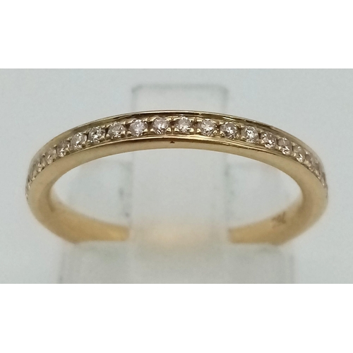 366 - An 18K Yellow Gold Diamond Half-Eternity Ring. 0.20ctw. Size J. 2.43g total weight.