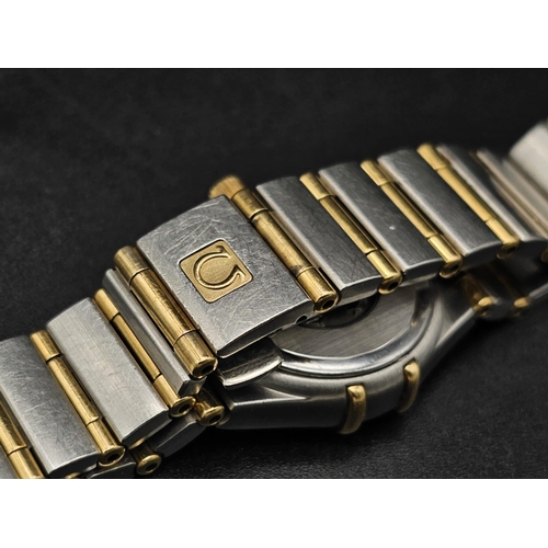 372 - An Omega 9K gold and Stainless Steel Constellation Ladies Watch. Bi-metal (gold and steel) bracelet ... 