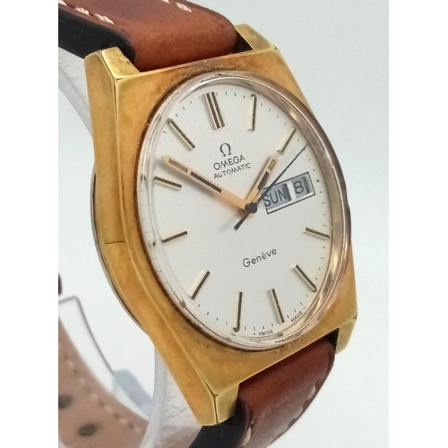 388 - A Vintage Omega Geneve Automatic Gents Watch. Two tone steel case. White dial with day/date window. ... 