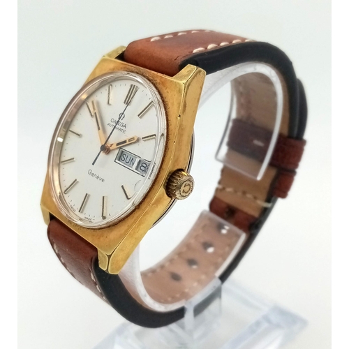 388 - A Vintage Omega Geneve Automatic Gents Watch. Two tone steel case. White dial with day/date window. ... 