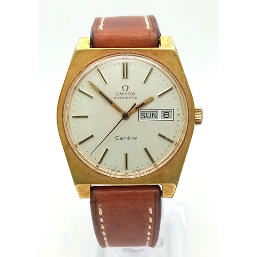 388 - A Vintage Omega Geneve Automatic Gents Watch. Two tone steel case. White dial with day/date window. ... 