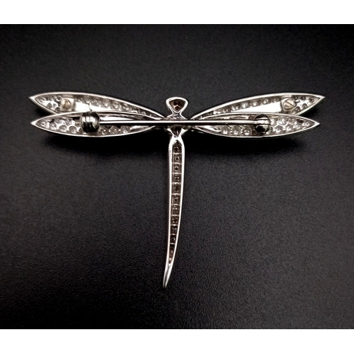 50 - A Wonderfully Crafted 18K White Gold Dragonfly Brooch. Approximately 3.5ct of diamonds. 5.5cm wingsp... 