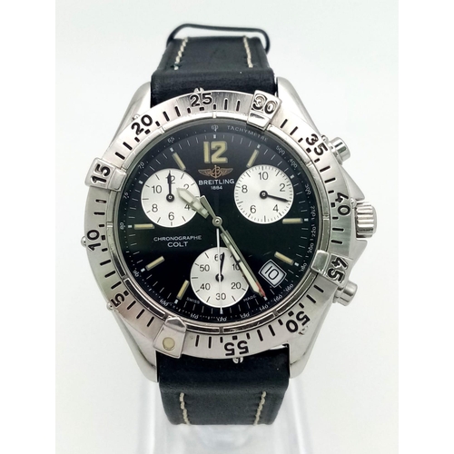 834 - A Breitling Colt Chronograph Gents Quartz Watch. Black leather strap. Stainless steel case - 38mm. B... 