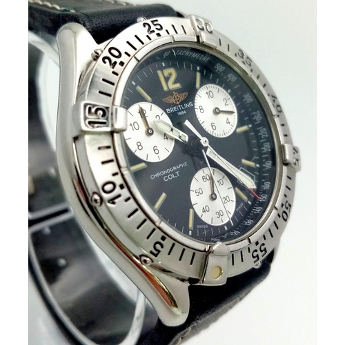 834 - A Breitling Colt Chronograph Gents Quartz Watch. Black leather strap. Stainless steel case - 38mm. B... 