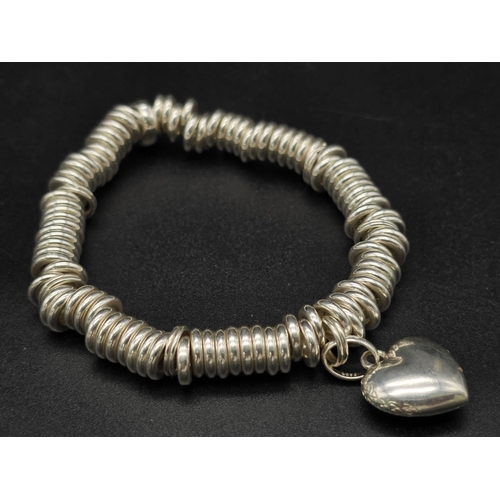 862 - A 925 Silver, Links Of London, Truly, Madly, Deeply Bracelet. Total Weight 57.16Grams