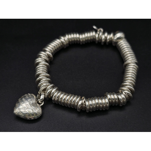 862 - A 925 Silver, Links Of London, Truly, Madly, Deeply Bracelet. Total Weight 57.16Grams