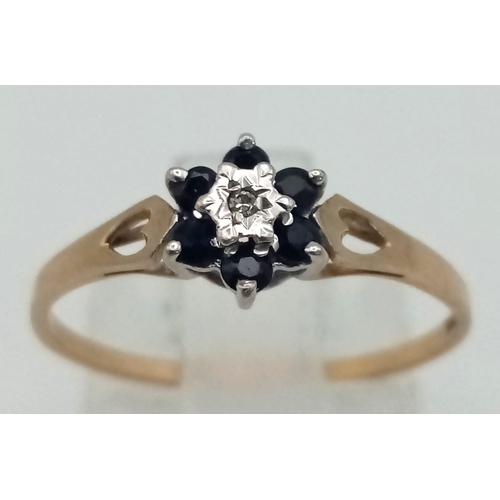 868 - A Vintage 9K Yellow Gold Diamond and Sapphire Ring. Size O. 1.03g total weight.