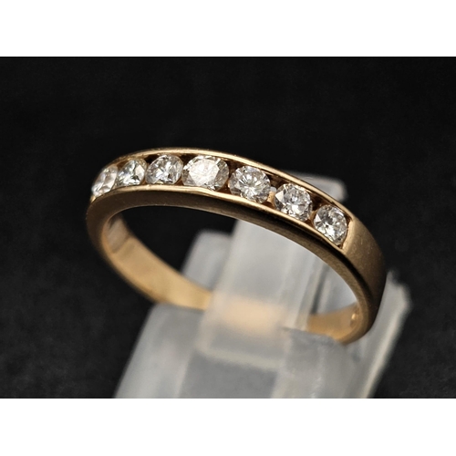 87 - An 18K Yellow Gold Diamond Half-Eternity Ring. 0.70ctw. Size O. 3g total weight.