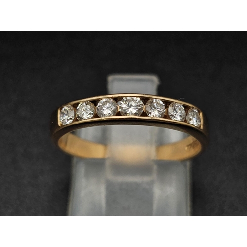 87 - An 18K Yellow Gold Diamond Half-Eternity Ring. 0.70ctw. Size O. 3g total weight.