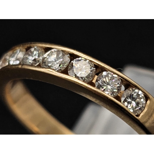 87 - An 18K Yellow Gold Diamond Half-Eternity Ring. 0.70ctw. Size O. 3g total weight.