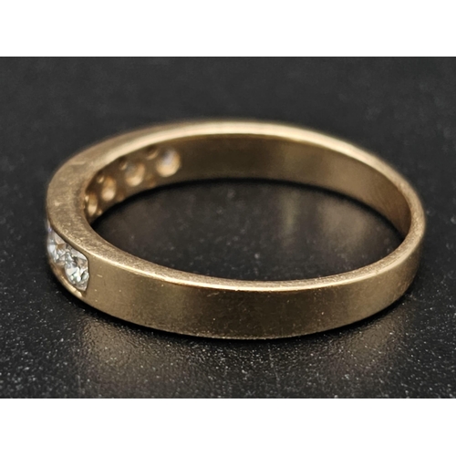 87 - An 18K Yellow Gold Diamond Half-Eternity Ring. 0.70ctw. Size O. 3g total weight.