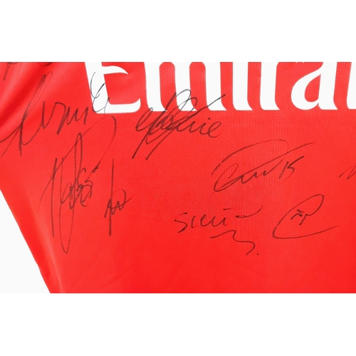 90 - An Arsenal Football Club 2008 Signed Home Emirates Red Shirt - Still with shop tags. 24 signatures. ... 