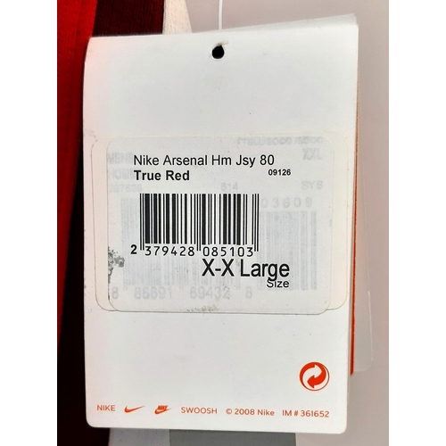 90 - An Arsenal Football Club 2008 Signed Home Emirates Red Shirt - Still with shop tags. 24 signatures. ... 