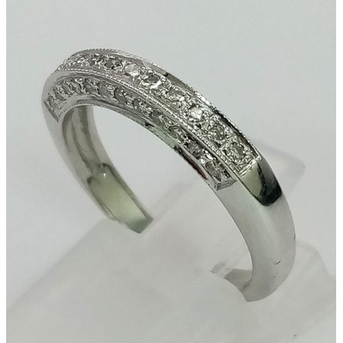 821 - 9k white gold diamond set half eternity ring with diamonds also set on sides (dia: 0.18ct), size N, ... 