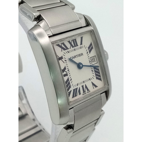 390 - A Cartier Tank Ladies Watch. Stainless steel bracelet and case - 25 x 28mm. White dial with Roman nu... 