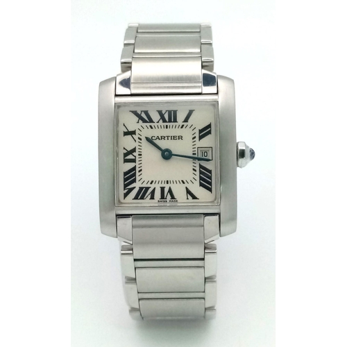 390 - A Cartier Tank Ladies Watch. Stainless steel bracelet and case - 25 x 28mm. White dial with Roman nu... 