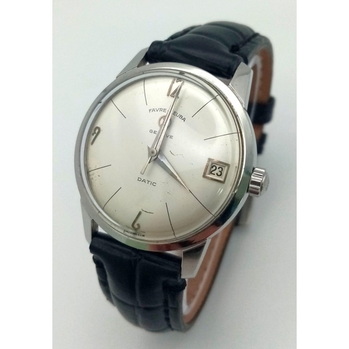 428 - A 1970s Favre-Leuba Datic Gents Watch. Black leather strap.
Stainless steel case - 35mm. White dial ... 