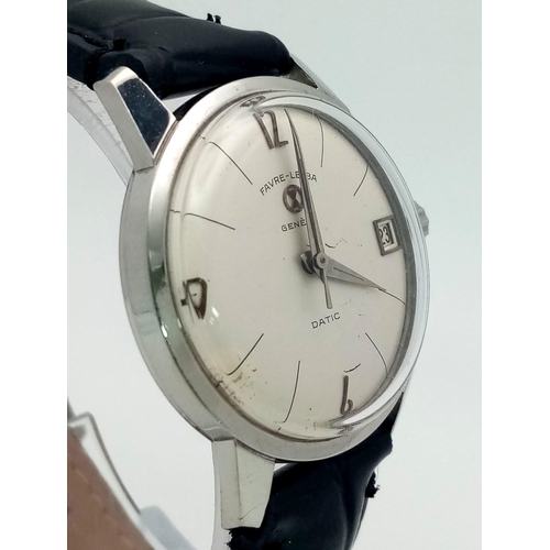 428 - A 1970s Favre-Leuba Datic Gents Watch. Black leather strap.
Stainless steel case - 35mm. White dial ... 