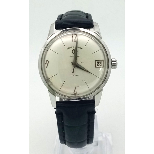 428 - A 1970s Favre-Leuba Datic Gents Watch. Black leather strap.
Stainless steel case - 35mm. White dial ... 