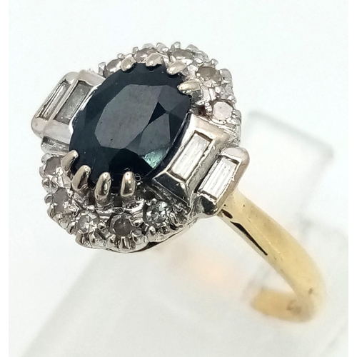 538 - A Stunning 18K Yellow Gold Sapphire and Diamond Ring. Central oval sapphire - 1.5ct with a 12 diamon... 