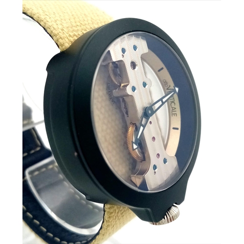 568 - A Verticale Mechanical Gents Watch. Beige cloth strap. Black case - 42mm. Skeleton dial. In excellen... 