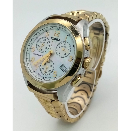 838 - A Timex Quartz Chronograph. Gold plated Strap and two tone case - 37mm. Mother of pearl dial with th... 