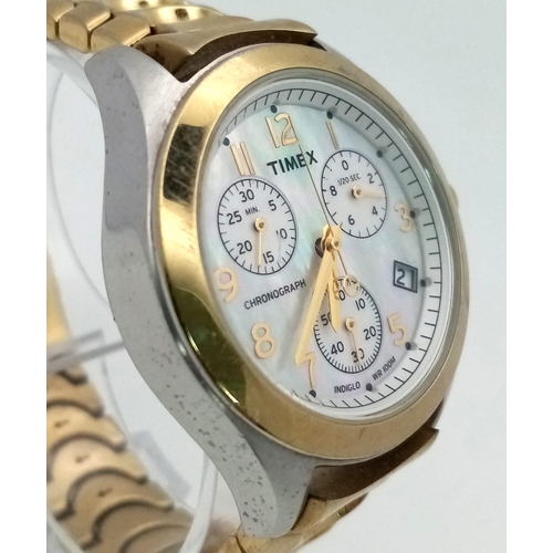 838 - A Timex Quartz Chronograph. Gold plated Strap and two tone case - 37mm. Mother of pearl dial with th... 