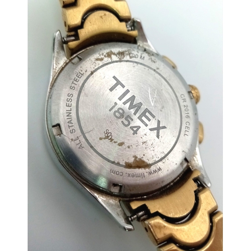 838 - A Timex Quartz Chronograph. Gold plated Strap and two tone case - 37mm. Mother of pearl dial with th... 