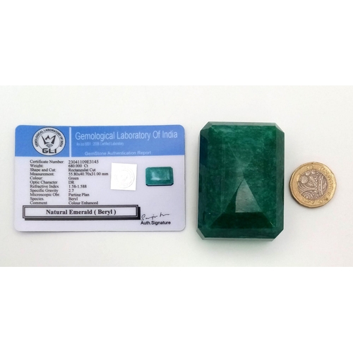 853 - A Large 680ct Natural Rectangular Shape Emerald. GLI Certified. This is a colour-enhanced gem.