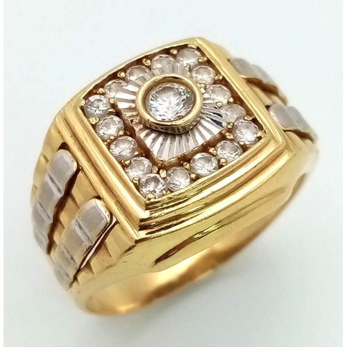 857 - An 18K Yellow Gold and White Cubic Zirconia Rolex Style Ring. Size Y. 10.5g total weight.