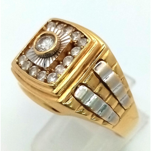 857 - An 18K Yellow Gold and White Cubic Zirconia Rolex Style Ring. Size Y. 10.5g total weight.