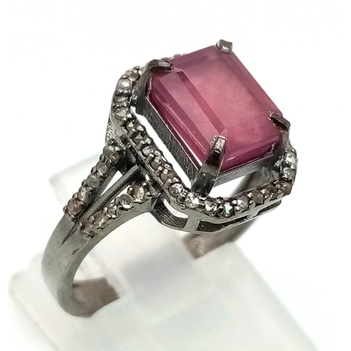 1264 - A Ruby Ring with Rose cut Diamonds. 925 Sterling silver. Burmese Ruby- 3.40ct. Diamond- 0.45ct. 3.5g... 