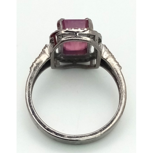 1264 - A Ruby Ring with Rose cut Diamonds. 925 Sterling silver. Burmese Ruby- 3.40ct. Diamond- 0.45ct. 3.5g... 