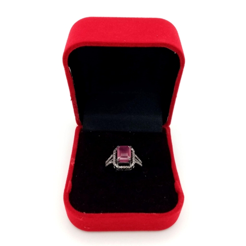 1264 - A Ruby Ring with Rose cut Diamonds. 925 Sterling silver. Burmese Ruby- 3.40ct. Diamond- 0.45ct. 3.5g... 