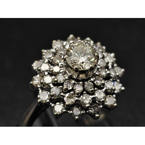 160 - An 18 K white gold ring with a cluster of diamonds (2.50 carats appr). Ring size: K, weight: 6.3 g. ... 