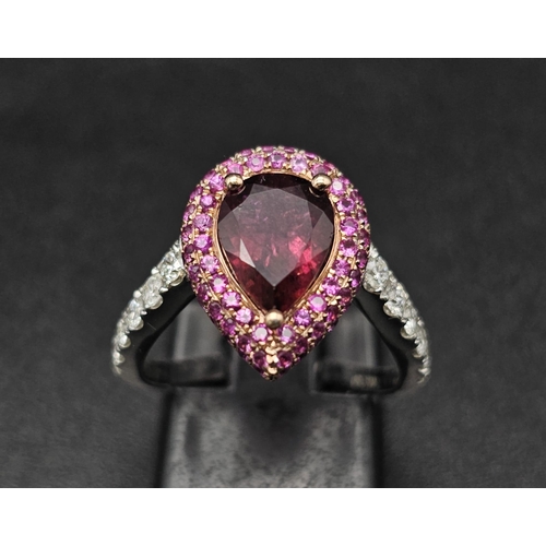 174 - An extraordinary 18 K white gold ring with a central pear cut rubelite  (3 carats appr), surrounded ... 