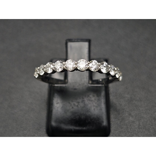 181 - A half eternity platinum diamond (0.70 carats) ring. Good quality  white diamonds VVS, ring size: M,... 