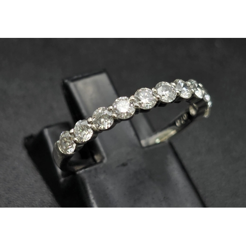 181 - A half eternity platinum diamond (0.70 carats) ring. Good quality  white diamonds VVS, ring size: M,... 