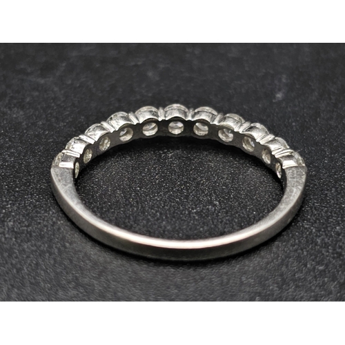 181 - A half eternity platinum diamond (0.70 carats) ring. Good quality  white diamonds VVS, ring size: M,... 