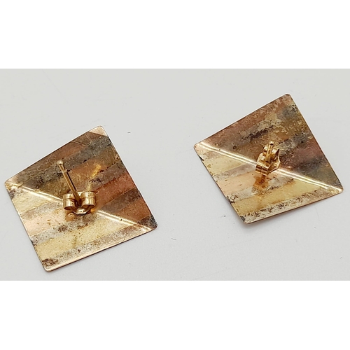 480 - A Pair of 9K Yellow Gold Tri-Colour Stealth-Stud Earrings.
0.91g total weight.