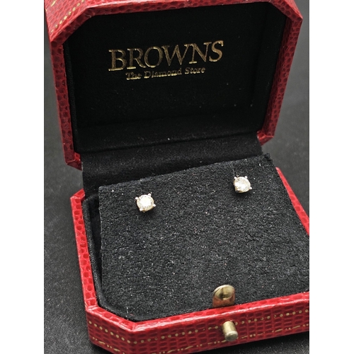 687 - A Pair of Browns Designer 18K Gold Diamond Stud Earrings. 
0.60ctw of bright, white VS1 diamonds. A ... 