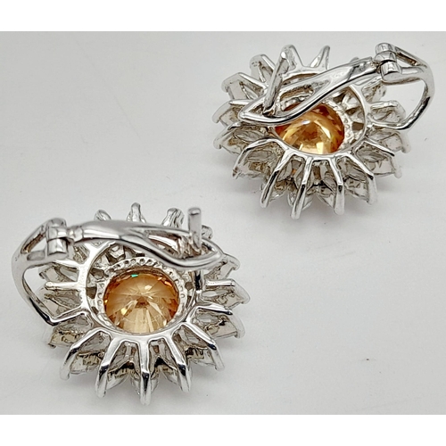 898 - A Pair of 925 Silver White and Pale Orange Stone Clip On Earrings.