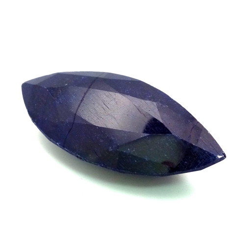 900 - A 394ct Faceted Natural Blue Sapphire. Marquise Shape. GLI Certified. Colour enhanced. Comes in a pr... 